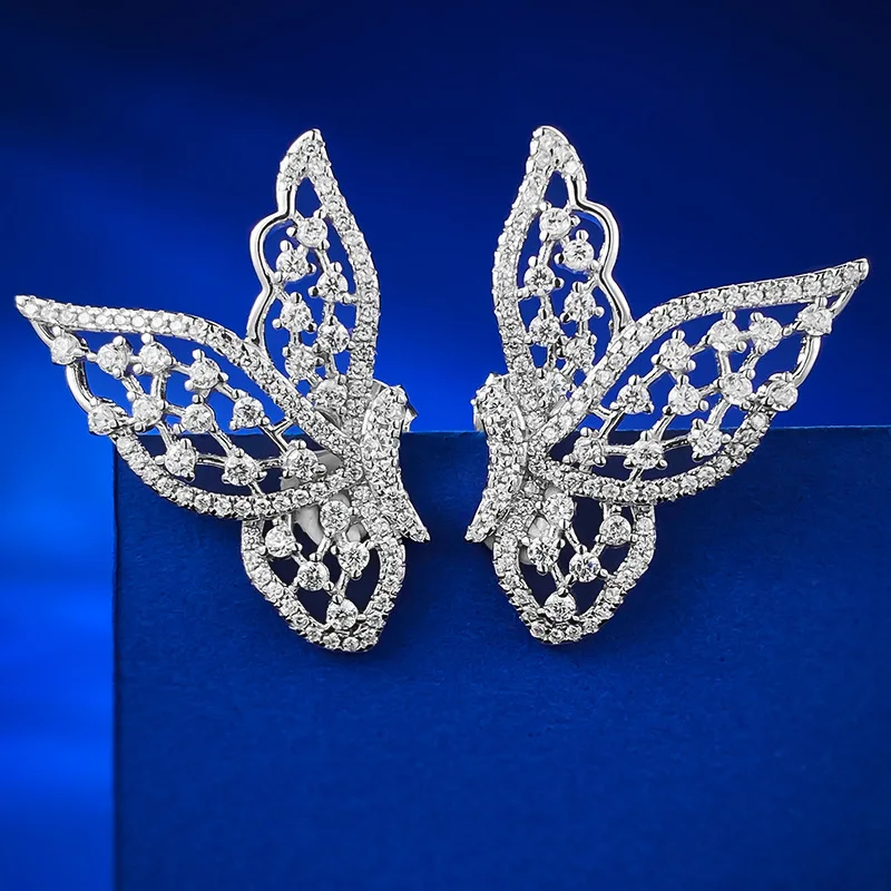 2023 Новые серебряные полые серьги-бабочки S925 с заклепками для ушей Женская простая индивидуальность, заклепки для ушей, Трансграничные вставки